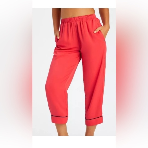 Fabletics Vibrant Red Eco Satin Cropped Pants with Black Accents - Picture 2 of 12
